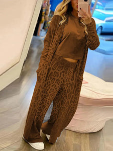 Completo tuta cardigan lungo e pantalone animalier