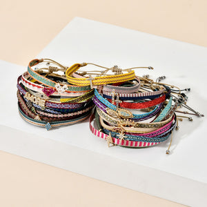 Braccialetti in cotone con charms